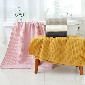 Soft cotton waffle weave bath towel set in multiple colors displayed in a modern bathroom