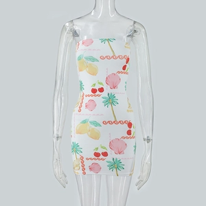 Detail of white strapless bodycon mini dress with summer lemon and seashell prints