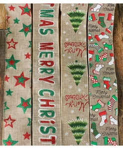 Detailed view of four burlap Christmas ribbons with wire edges and festive prints