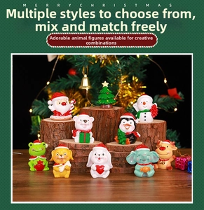 Miniature Christmas resin figurines including Santa and reindeer for festive tabletop decor