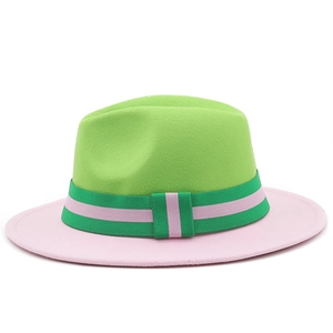 Detail of lime green and light pink wool fedora hat with striped band and brim accent