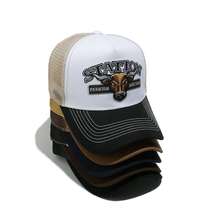 Retro bull head embroidered mesh trucker hat with breathable panels and a stylish flat brim
