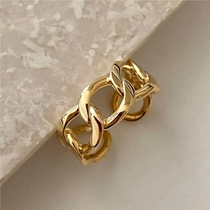 Minimalist gold-plated Cuban link chain ring with a polished finish and elegant design