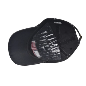 Detailed interior of washed cotton baseball cap featuring US flag embroidery and high-quality stitching