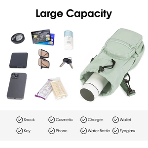 Detail showing large capacity of the light green water bottle bag with side zipper pocket