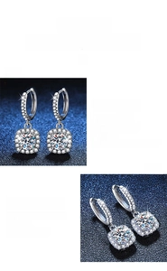 Macro shot of Moissanite earrings with four-prong setting and pavé detailing