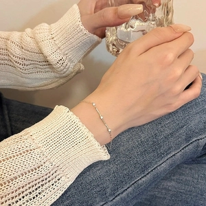 S925 silver Mobius bracelet featuring cubic zirconia stones on a delicate chain wrist