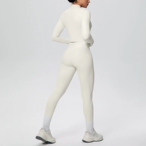 Back view of slim fit cream yoga set featuring high-waist leggings and long-sleeve top