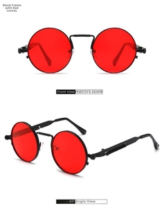 Close-up of steampunk round sunglasses featuring spring temples and red lenses