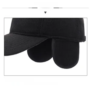 Detail display of winter baseball cap with thick ear flaps and warm lining in black