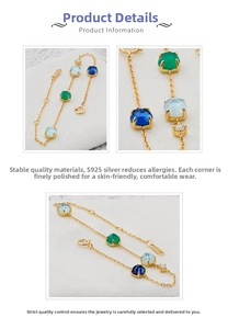 Macro detail of S925 silver 14k gold plated bracelet with green and blue gemstones