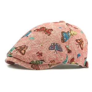 Pink vintage jacquard beret hat for women with colorful butterfly patterns on white background