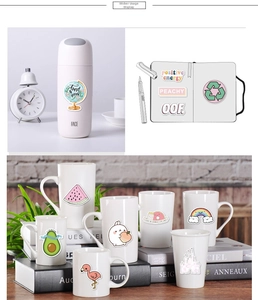 Colorful VSCO stickers applied on a water bottle, notebook and ceramic mug decoration