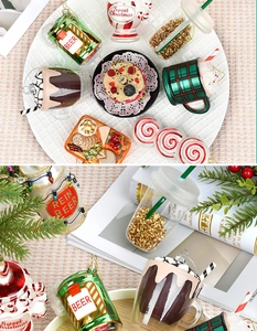 Detailed view of glass-painted Christmas ornaments in food and beverage shapes with glitter