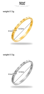 Detailed view showing gold and silver heart-patterned bangles with size dimensions