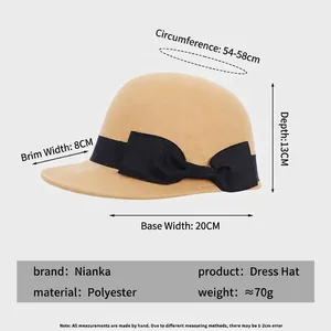 Vintage camel wool felt newsboy hat with black bow and size specifications