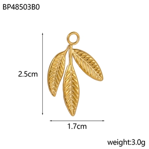 Detailed macro view of golden leaf pendant with dimensions 2.5cm by 1.7cm for DIY jewelry