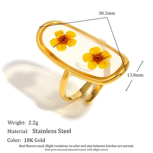 18K gold plated stainless steel open ring featuring yellow dried flowers in acrylic resin