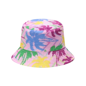 Tropical coconut tree print bucket hat with pink base and colorful palm tree patterns