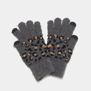 Close-up of grey knit gloves with leopard pattern and touchscreen compatible fingertips