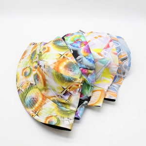 Colorful tie-dye fisherman bucket hats with abstract patterns for outdoor sun protection