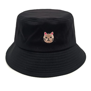 Close-up of black cotton bucket hat featuring detailed cute cat head embroidery
