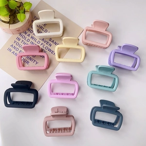 Set of 10 matte square hollow hair claws in various colors for elegant hairstyling