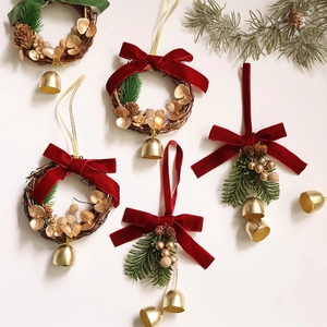 Set of 5 Christmas wreath ornaments with red velvet bows, pine cones and gold bells