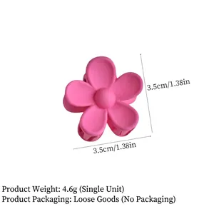 Pink matte flower hair claw clip with 3.5cm diameter measurement on white background