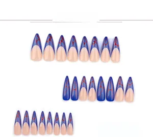 Detail view of extra-long stiletto nails with blue tips and red flame patterns