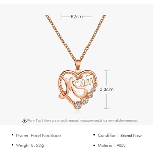 Detail view of rose gold Mom heart necklace with sparkling rhinestones and sizing info