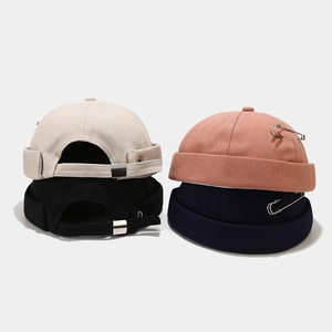 Unisex cotton Miki hats with metal pin accent in beige pink black and navy blue colors