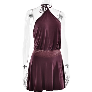 Detail view of purple halter neck dress with delicate lace waist trim and soft pleated fabric