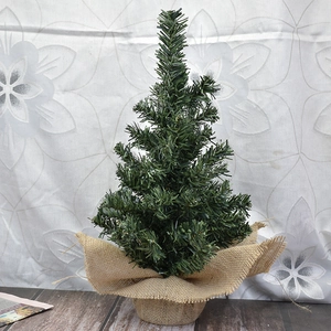 Mini artificial green Christmas tree with burlap base for desktop window decoration