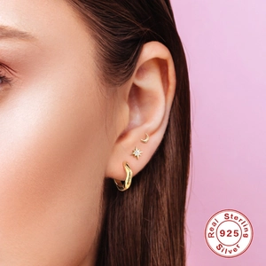 S925 sterling silver gold earring set featuring star, moon, and wavy hoop designs