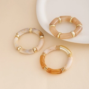 Three-piece acrylic bamboo bangle set with gold beads in cream, marble brown and amber