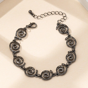 Elegant black metallic spiral link bracelet with extension chain and lobster clasp