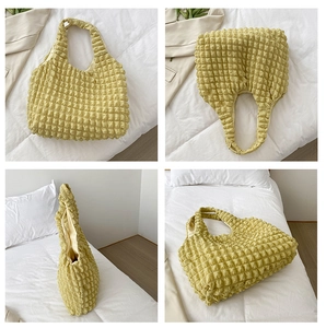 Macro views of yellow pleated tote bag showing bubble texture and spacious design