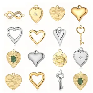 Vintage titanium steel charms collection including heart and infinity symbols in 18k gold
