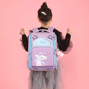 Ergonomic unicorn school backpack for girls in violet and light blue with wide straps