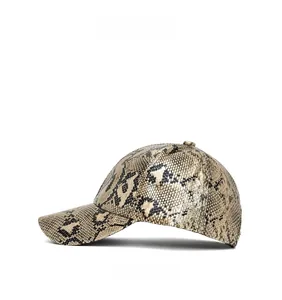 Side view detail of fashion snakeskin pattern baseball cap with textured faux PU leather