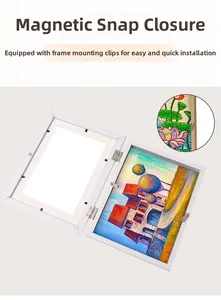 Detail of white art frame with magnetic closure and metal hinges for easy artwork storage