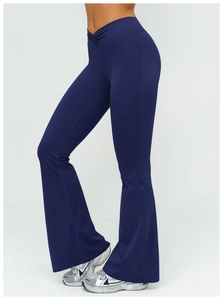 Detailed side view of high-waisted flared yoga pants with V-shaped ruched waistband