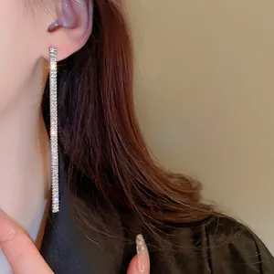 Elegant long tassel drop earrings with sparkling rectangular zircons on silver pins