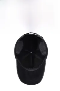 Detail of winter baseball cap showing thick plush lining and protective ear flaps
