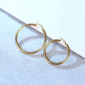 Elegant gold hollow stainless steel hoop earrings in various sizes for women
