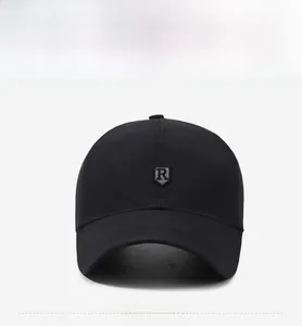Close-up of black baseball cap featuring detailed R embroidery and breathable fabric