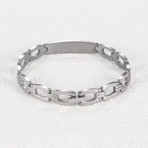 Detailed view of silver stainless steel ID bracelet with smooth plate and rectangular links