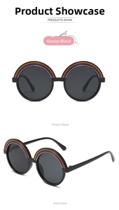 Close-up of black round sunglasses with colorful rainbow detail on the frame front and side