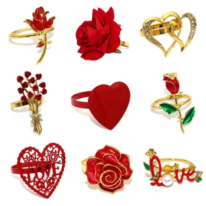 Set of 9 gold metal napkin rings with red roses, heart shapes, and sparkling crystals